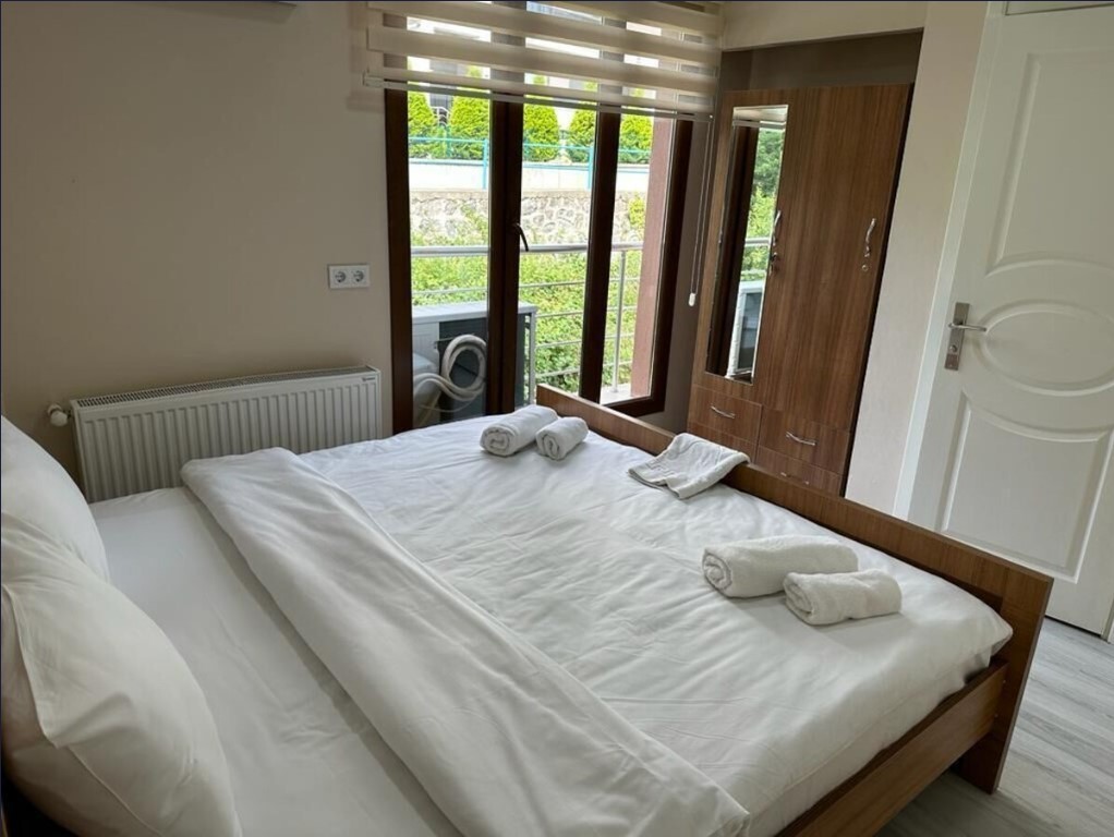 Quad Room *İki Tek Bir Çift Kişilik Oda*